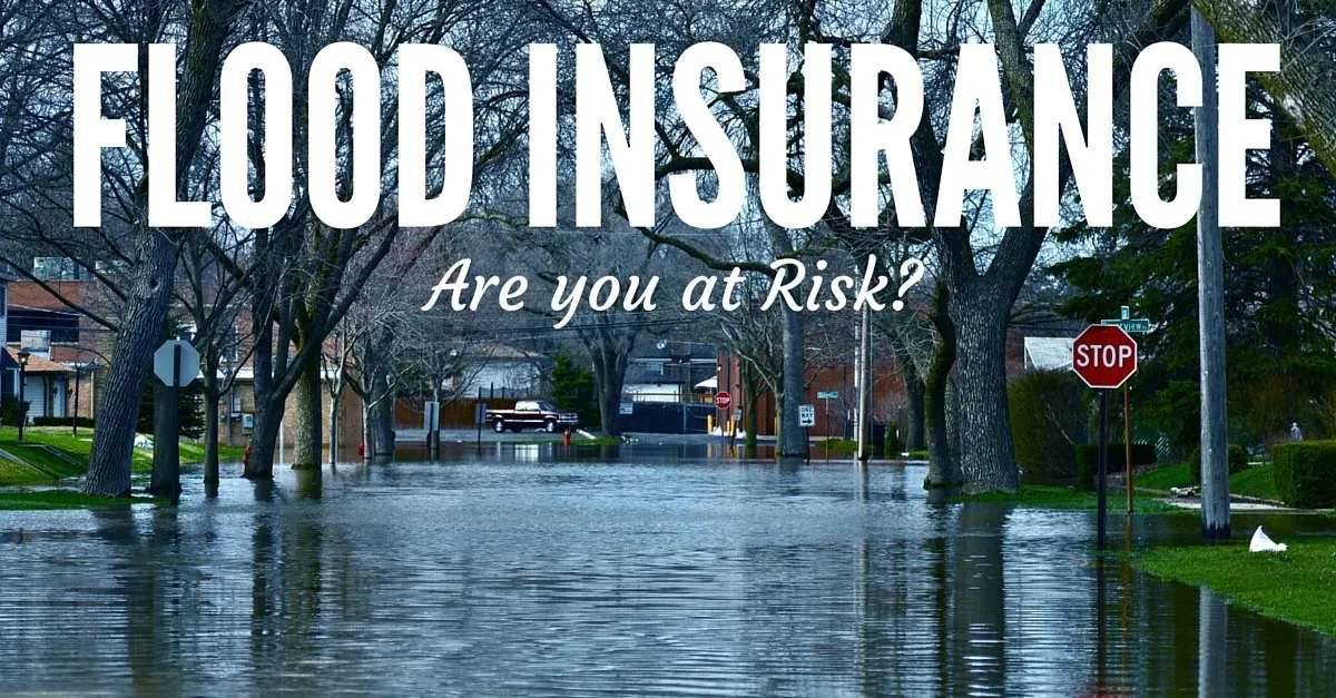 "House surrounded by floodwaters illustrating the importance of flood insurance in Dayton, Ohio"