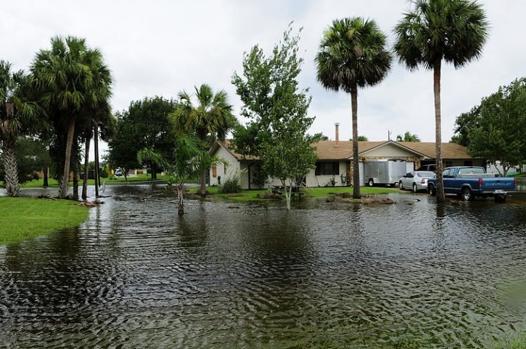 "Flooded residential area in Dayton, Ohio highlighting the importance of comprehensive flood insurance coverage."